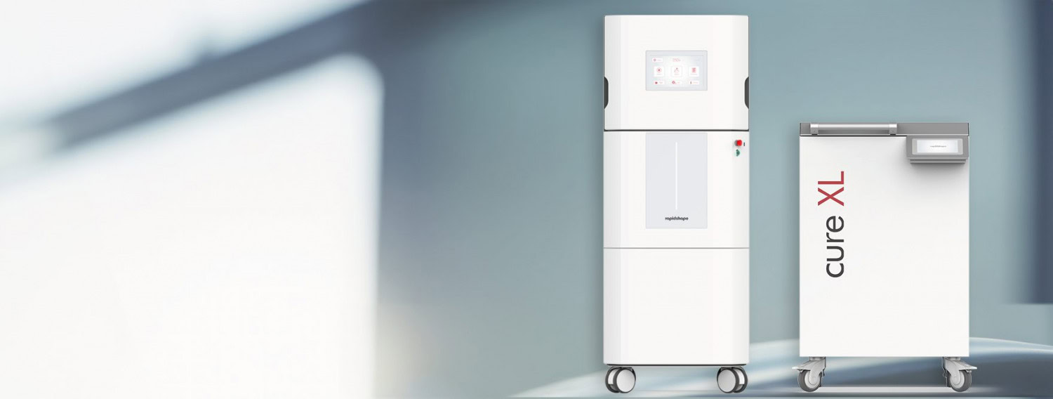 D50+ 3D printer with triple print range, automated part separation, and resin refill system for high-volume, continuous printing without manual intervention. RS cure XL curing machine with extra-large volume, ideal for efficient post-curing of large or numerous 3D-printed components, featuring 360° illumination and vacuum technology to reduce operating costs.