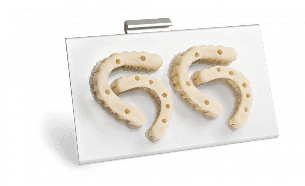 4 Full Arch Implants printed on the ONE's build platform