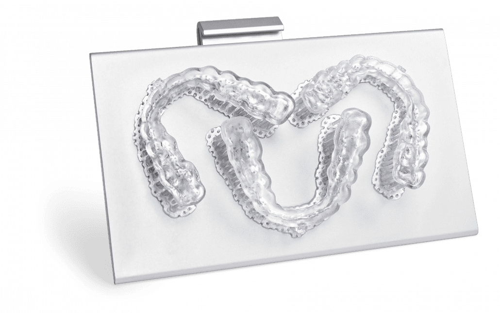 Three dental splints printed on the ONE's build platform