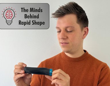 Image of Paul holding a 3D printed part