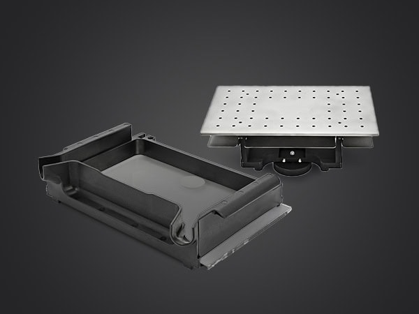 Image of the PRO 30's Resin Reservoir and Perforated Build Platform for 3D Printing
